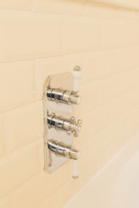 close up of shower taps