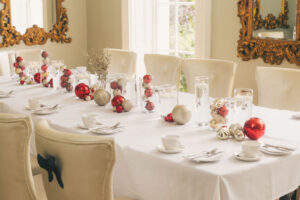 dining table set up with a christmas theme