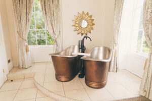 two bath tubs next to each other