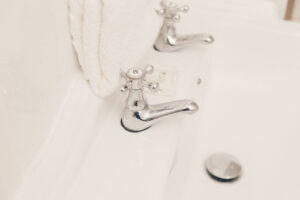 close up of taps on sink