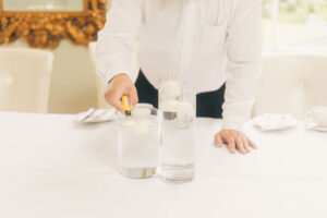 person lighting candles